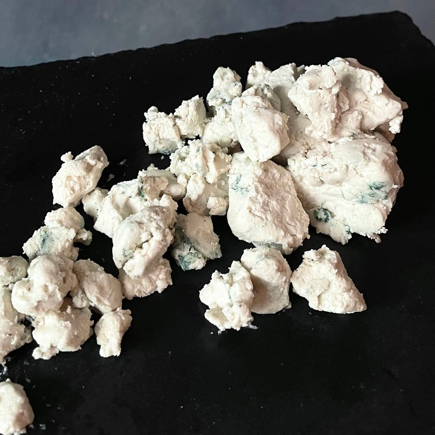 Crumbly vegan Blue Cheese. Plant-based cheese for your vegan charcuterie board. Available for Philly delivery